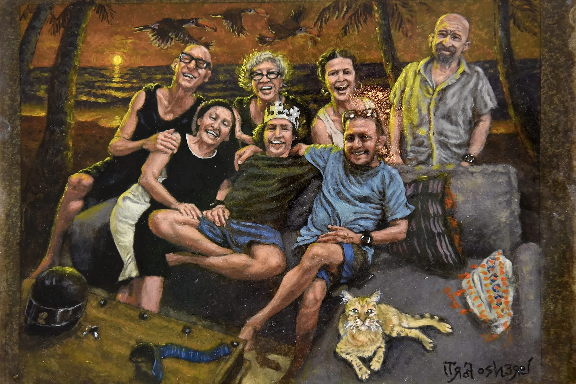 Un gruppo di amici seduti insieme davanti al mare al tramonto, con un gatto